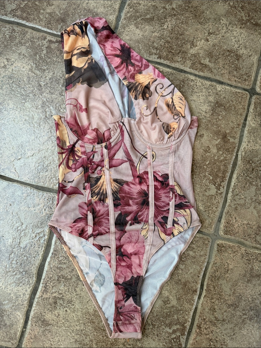 Women’s bottom snap bodysuit in Blush Pink Floral. Size XS